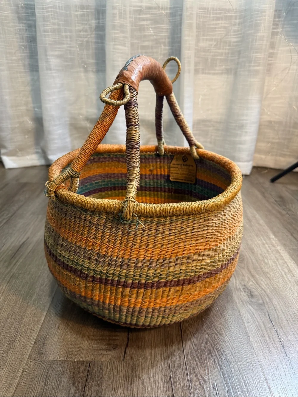 Large handmade vintage shopping basket with a leather handle.